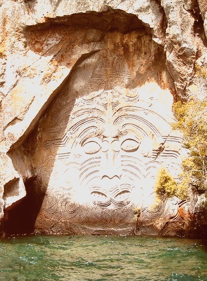 visitheworld:Maori rock carvings at Mine Bay on Lake Taupo, New Zealand